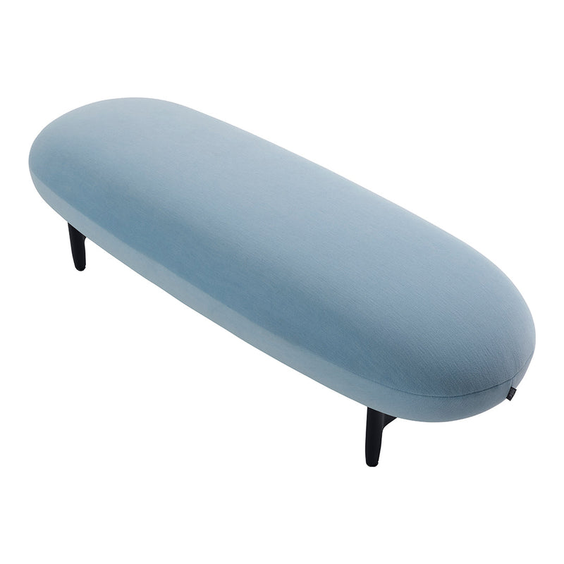 Soft blue oval bench with smooth upholstery and sleek black legs, perfect for modern decor.