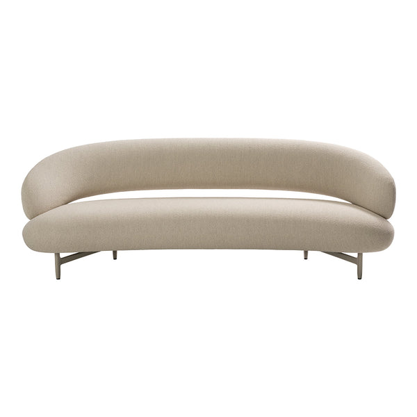 Beige curved sofa with smooth upholstery and minimalistic design, featuring a seamless, soft silhouette.