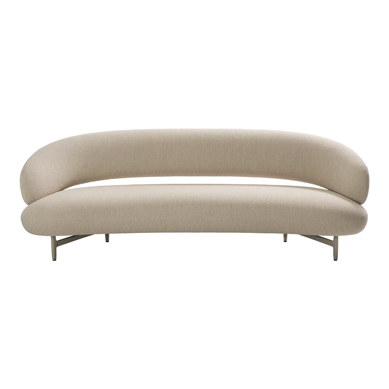 Beige curved sofa with smooth upholstery and minimalistic design, featuring a seamless, soft silhouette.