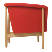 Red upholstered chair with a sleek design and wooden legs, showcasing a modern, minimalist aesthetic.