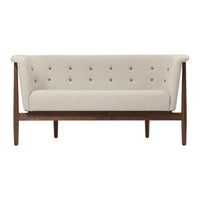 Beige tufted upholstery sofa with a walnut wooden frame and legs, featuring a minimalist design.