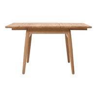 Natural wood dining table with a warm, light oak finish and clean, minimalist design. Perfect for any dining space.