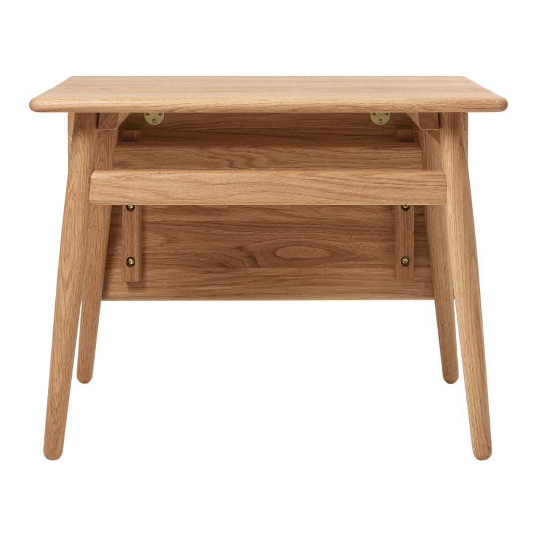 Natural wood storage desk in light oak finish with minimalist design and sleek lines. Perfect for modern interiors.