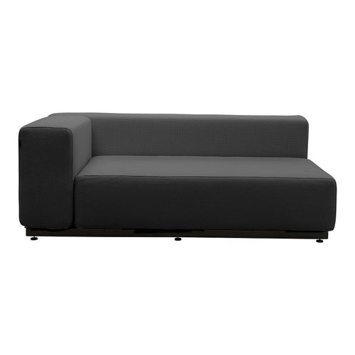 Modern black modular sofa with clean lines and a minimalist design, perfect for contemporary spaces.