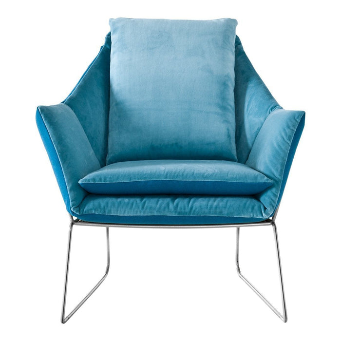 Modern chair in soft teal velvet with sleek silver legs, featuring smooth, contoured shapes and plush cushioning.