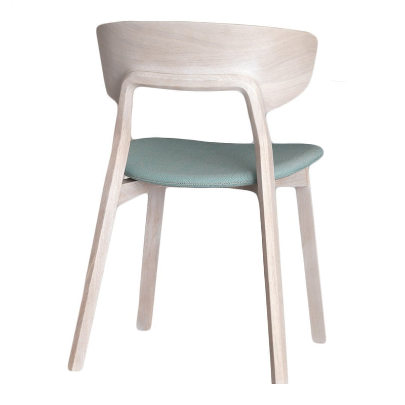Light wood chair with a smooth finish and soft mint green cushioned seat. Simple, modern design.