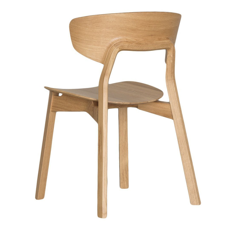 Light oak wooden chair showcasing a smooth, natural finish with simple, curved lines and a minimalist design.