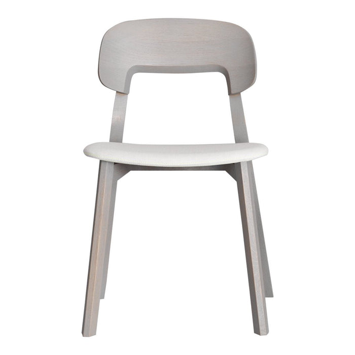 Minimalist light gray wooden chair with a smooth white seat, featuring a simple and modern design.