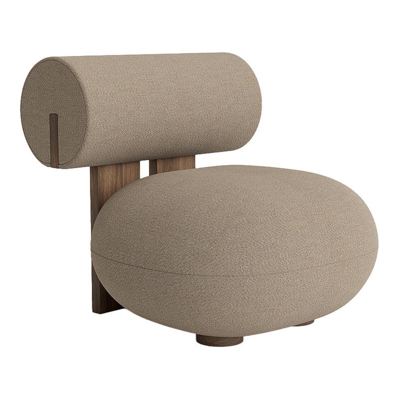Beige upholstered chair with a round cushion and tubular backrest, featuring a smooth texture and minimalist design.