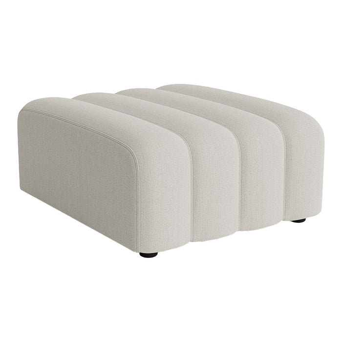 Neutral cream ottoman with a sleek, modern curved design and textured fabric. Ideal for contemporary decor.