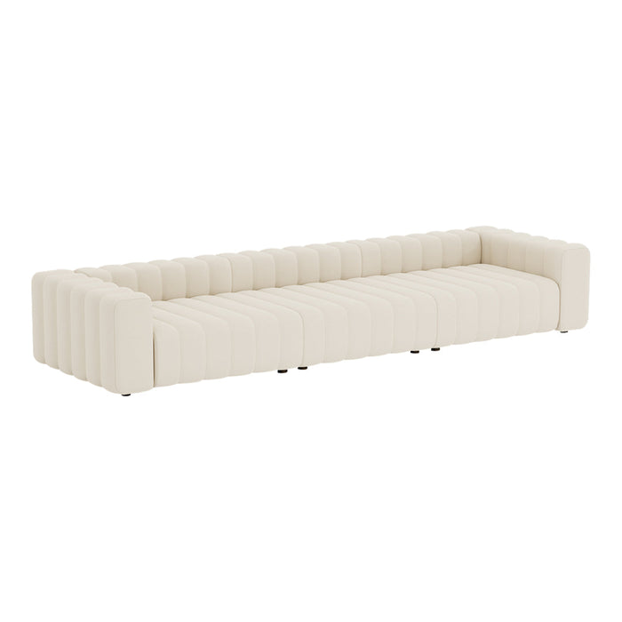 Cream-colored sofa with a modern ribbed pattern, featuring sleek, contemporary lines and minimalist design.
