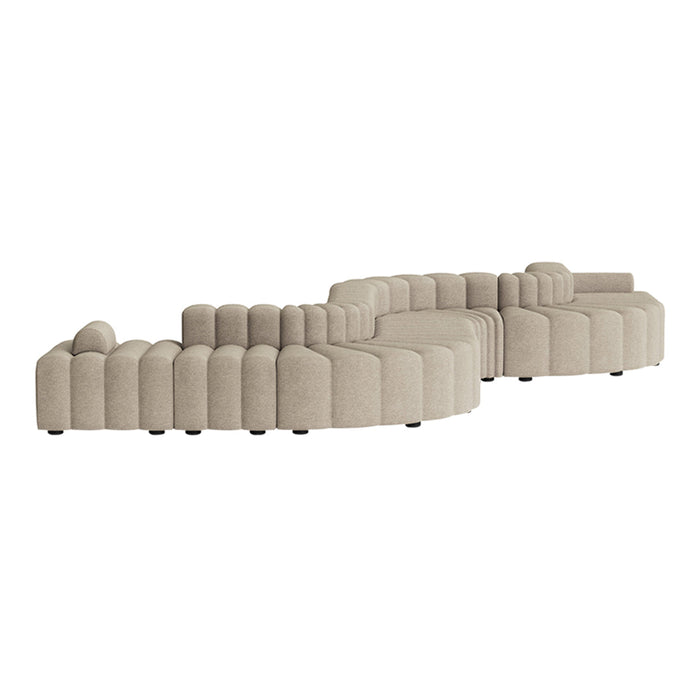 Beige curved sectional sofa with plush, rounded patterns and textured upholstery for modern living spaces.