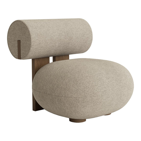 Beige textured chair with a rounded shape and cylindrical backrest, showcasing a modern minimalist design.