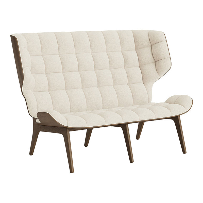 Beige tufted fabric sofa with wooden legs, featuring a modern design and smooth, minimalistic lines.