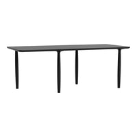"Modern black dining table with a sleek, minimalistic design and smooth surface, perfect for contemporary settings."