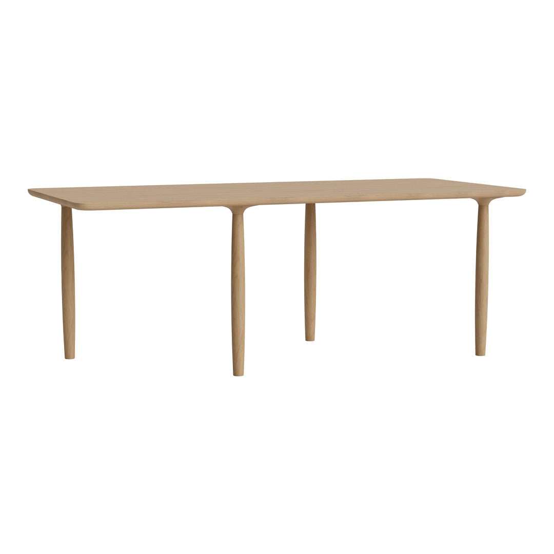 Light wood dining table with a smooth finish and simple, modern design. Ideal for contemporary interiors.