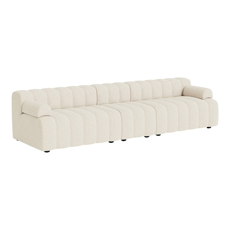 Cream-colored tufted sofa with a sleek, modern design and soft, subtle vertical stripes.