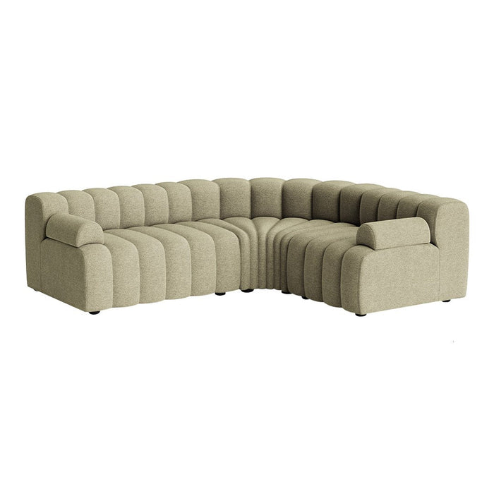 Lush beige sectional sofa with soft, ribbed texture and rounded edges in contemporary design. Perfect for modern interiors.