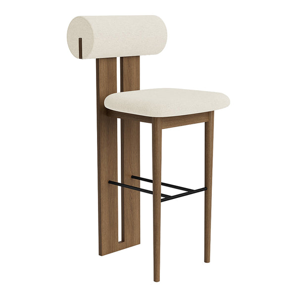Cream upholstered bar stool with natural wood legs and a sleek black footrest, featuring a modern minimalist design.
