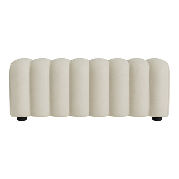 Beige ribbed upholstered bench with soft, curved lines and a contemporary design, perfect for modern living spaces.