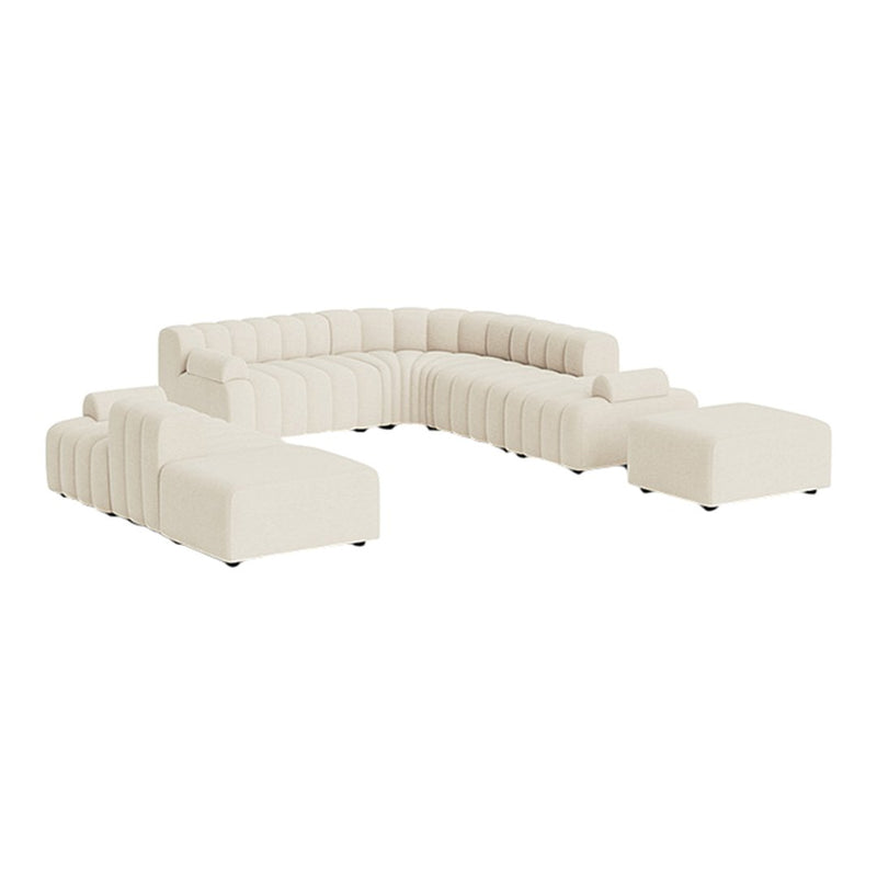 Modern beige sectional sofa with a ribbed texture and clean lines, perfect for contemporary living spaces.