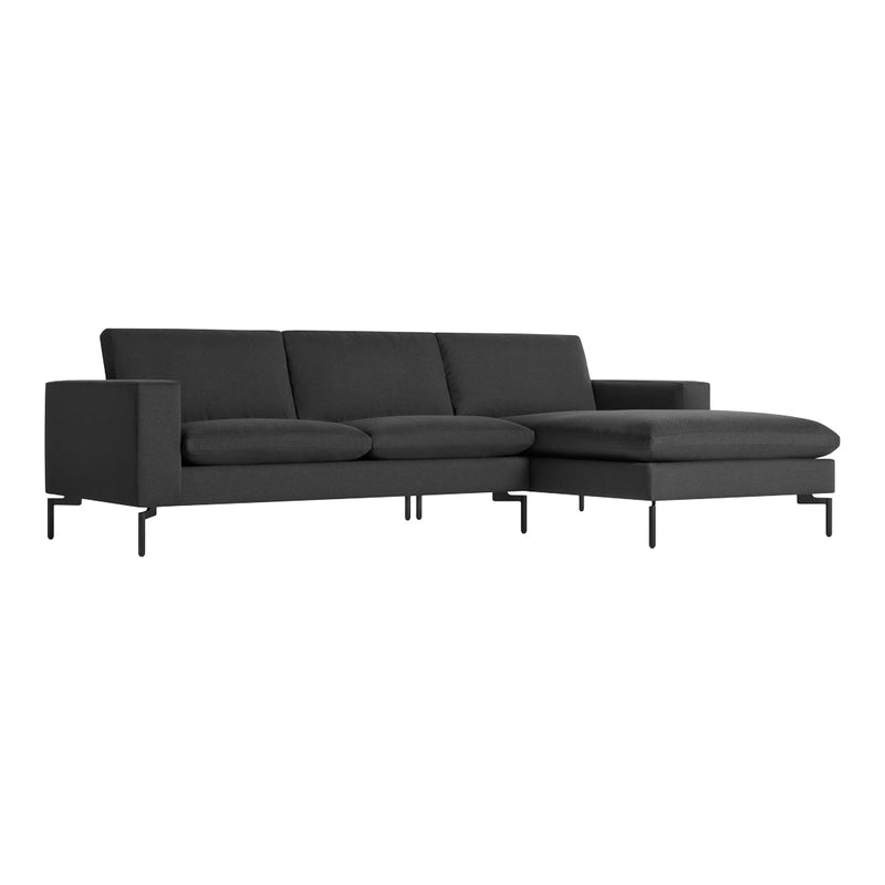 Stylish dark grey sectional sofa with a sleek design and smooth fabric upholstery. Perfect for modern living spaces.