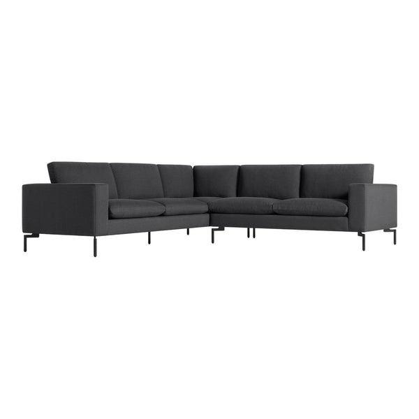 Modern dark gray sectional sofa with sleek black legs, showcasing a minimalist design and soft fabric texture.