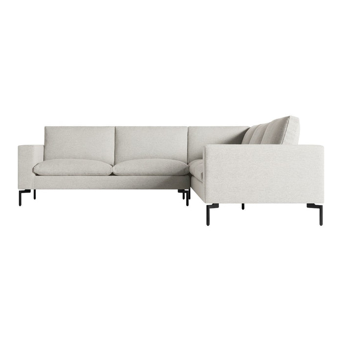 Light gray sectional sofa with subtle texture and black metal legs, offering a modern and minimalist design.