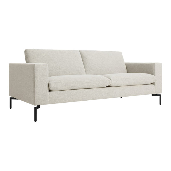 Light beige modern sofa with a textured fabric and sleek black metal legs. Perfect for minimalist decor.