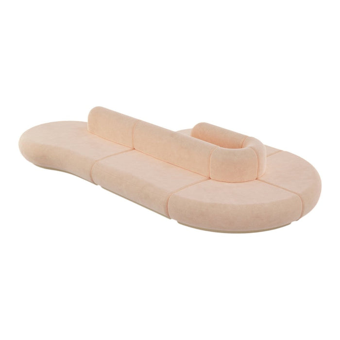 Soft peach-colored foam with a smooth surface, featuring curved edges and a minimalist design. Perfect for home decor.