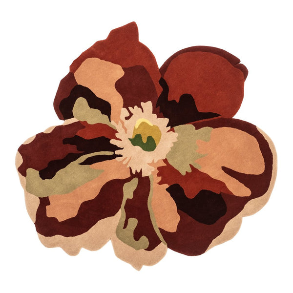 Colorful floral rug featuring earthy tones of brown, beige, green, and rust with a bold, contemporary pattern.