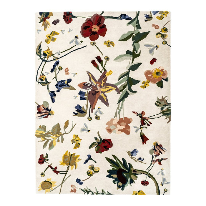 Floral pattern featuring vibrant reds, blues, and yellows on a soft cream background. Perfect for adding color!