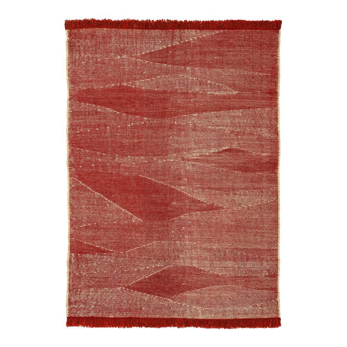 Red and beige patterned area rug with abstract wave designs and fringe edges. Ideal for cozy decor.