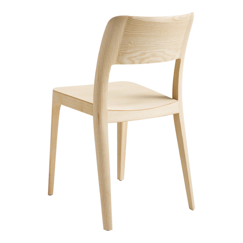 Light wood dining chair with a smooth, natural finish and minimalist design, highlighting its organic grain patterns.