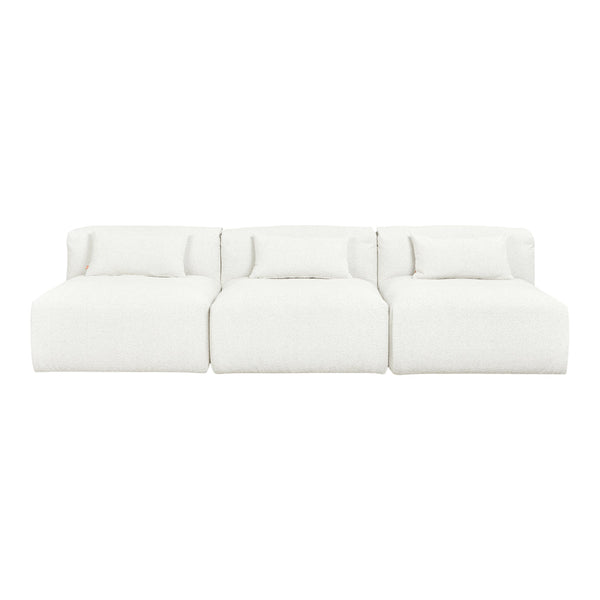 White, plush three-section sofa with soft textured fabric and matching cushions, perfect for a modern living space.