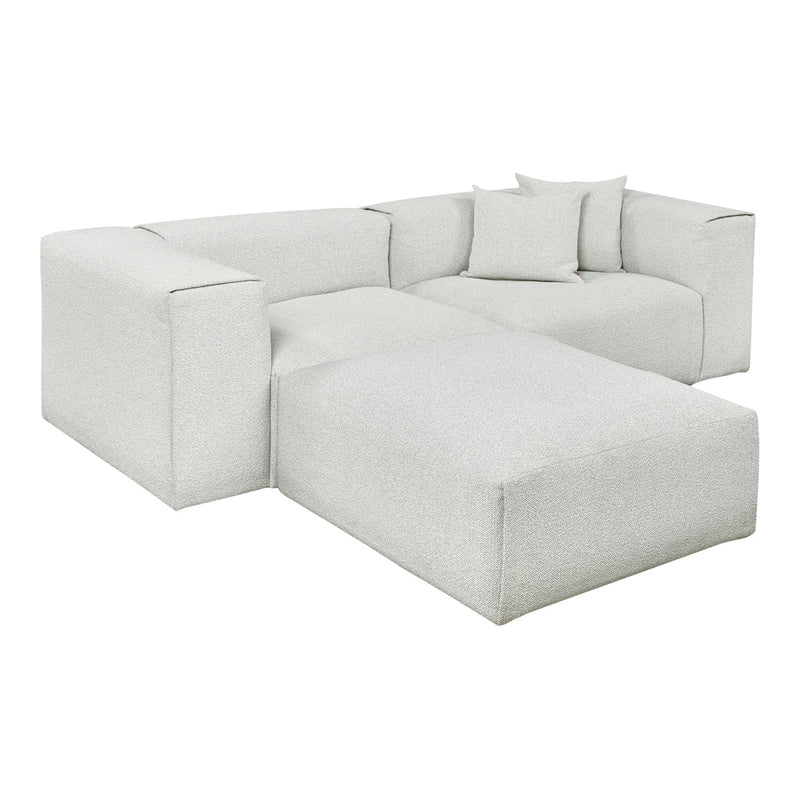 Modern sectional sofa in a soft, textured light grey color with matching accent pillows. Perfect for any living space.