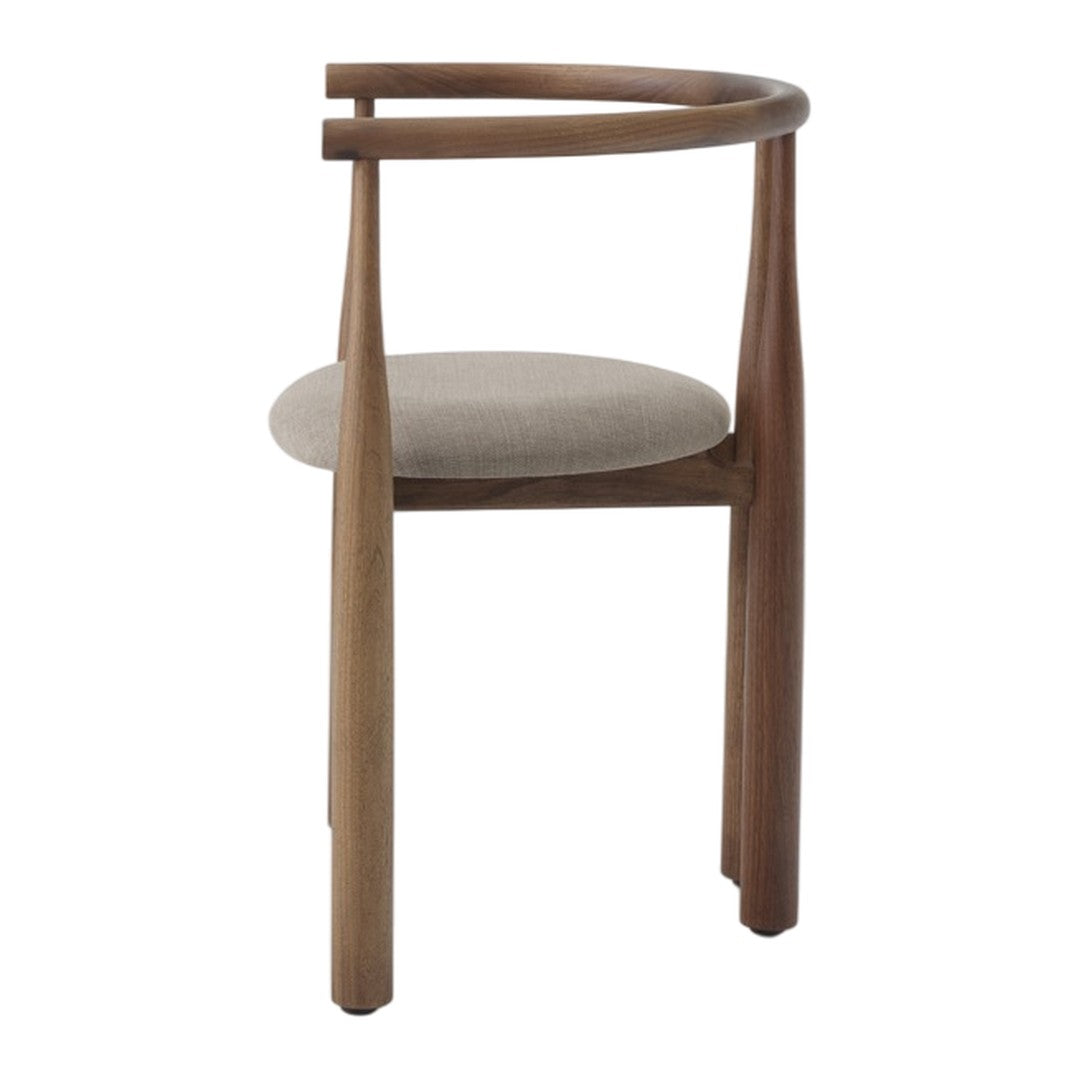 Wooden chair with a beige cushion on a white background