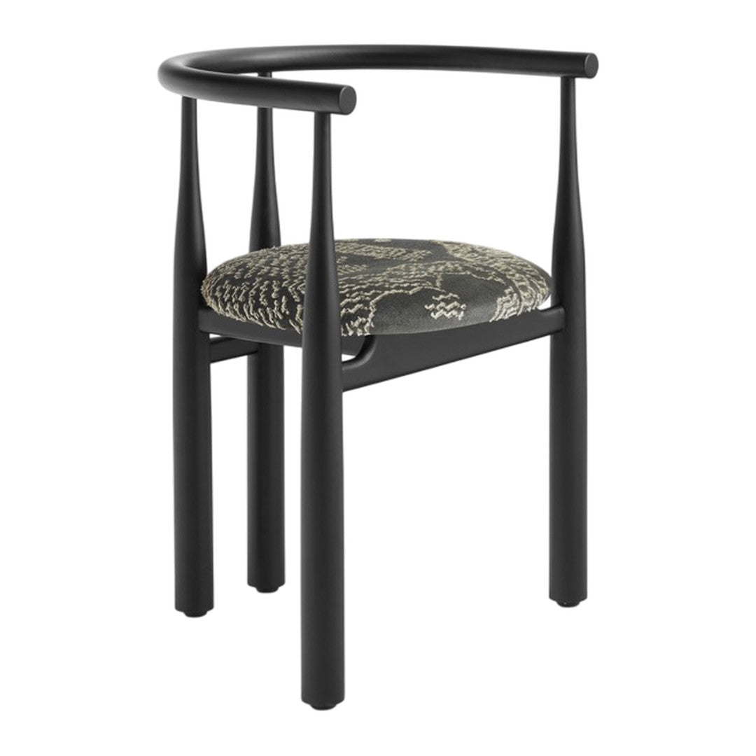 Black chair with patterned cushion on a white background