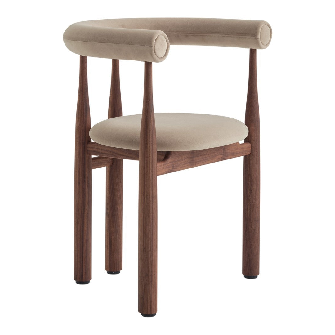 Beige velvet upholstered chair with dark walnut wooden legs and curved armrests. Modern and stylish design.