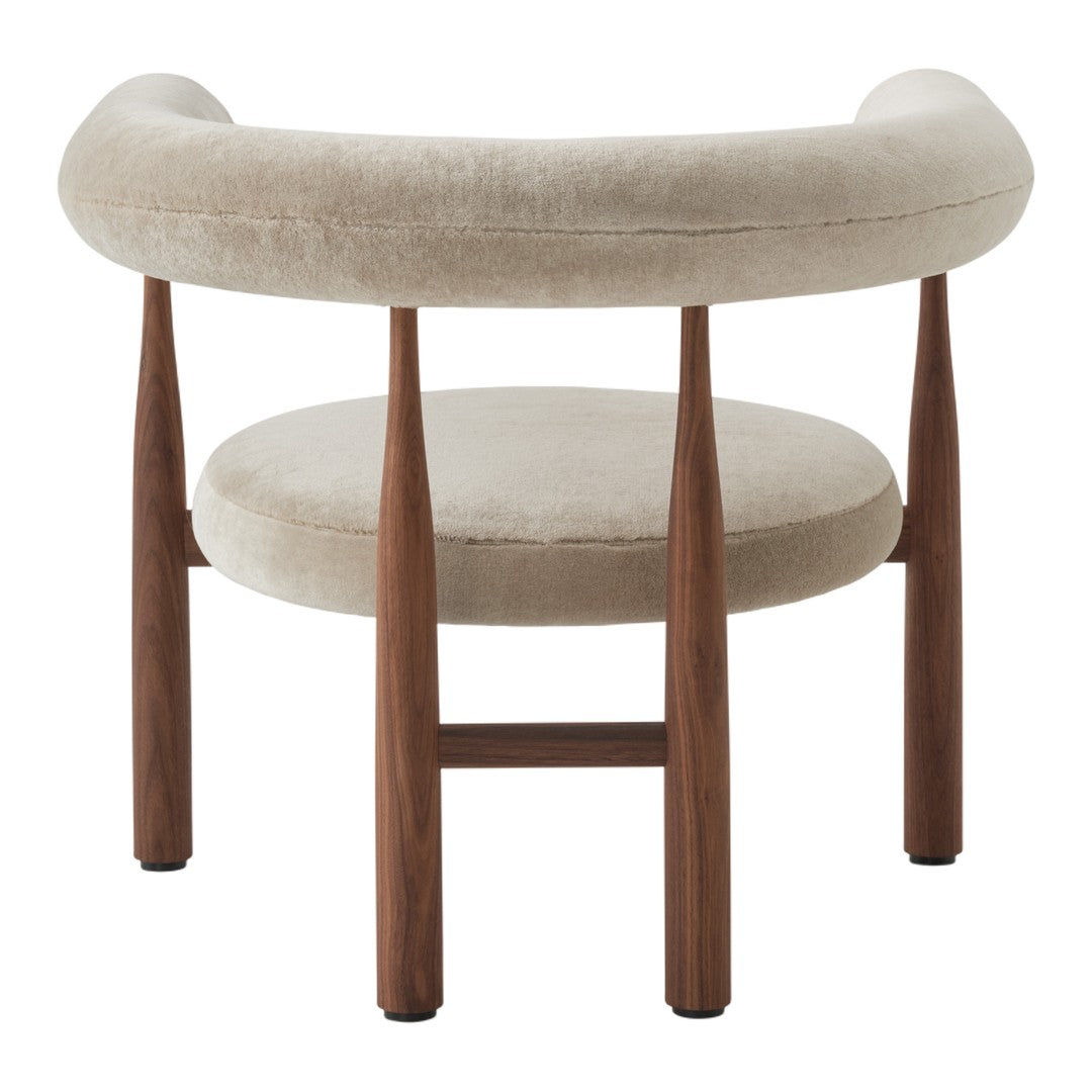 Stool with curved beige seat and wooden legs on a white background