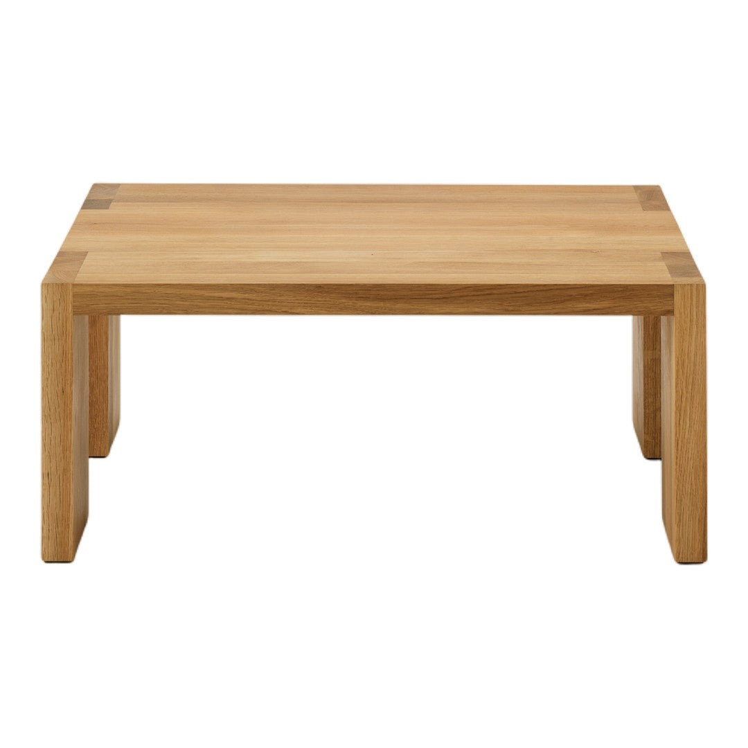 Natural wood coffee table with light oak finish and simple, modern design. Perfect for minimalist decor.