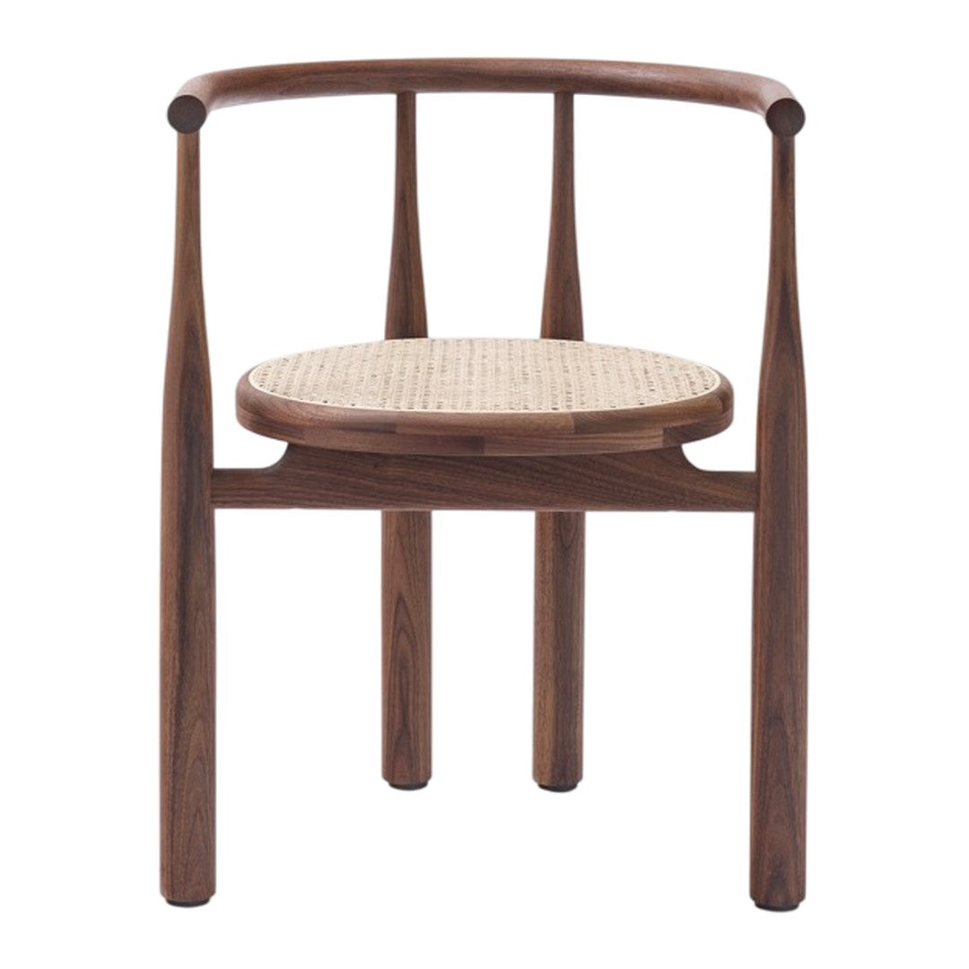 Modern wooden chair in rich walnut with a natural woven cane seat. Elegant design featuring smooth curves and neutral tones.