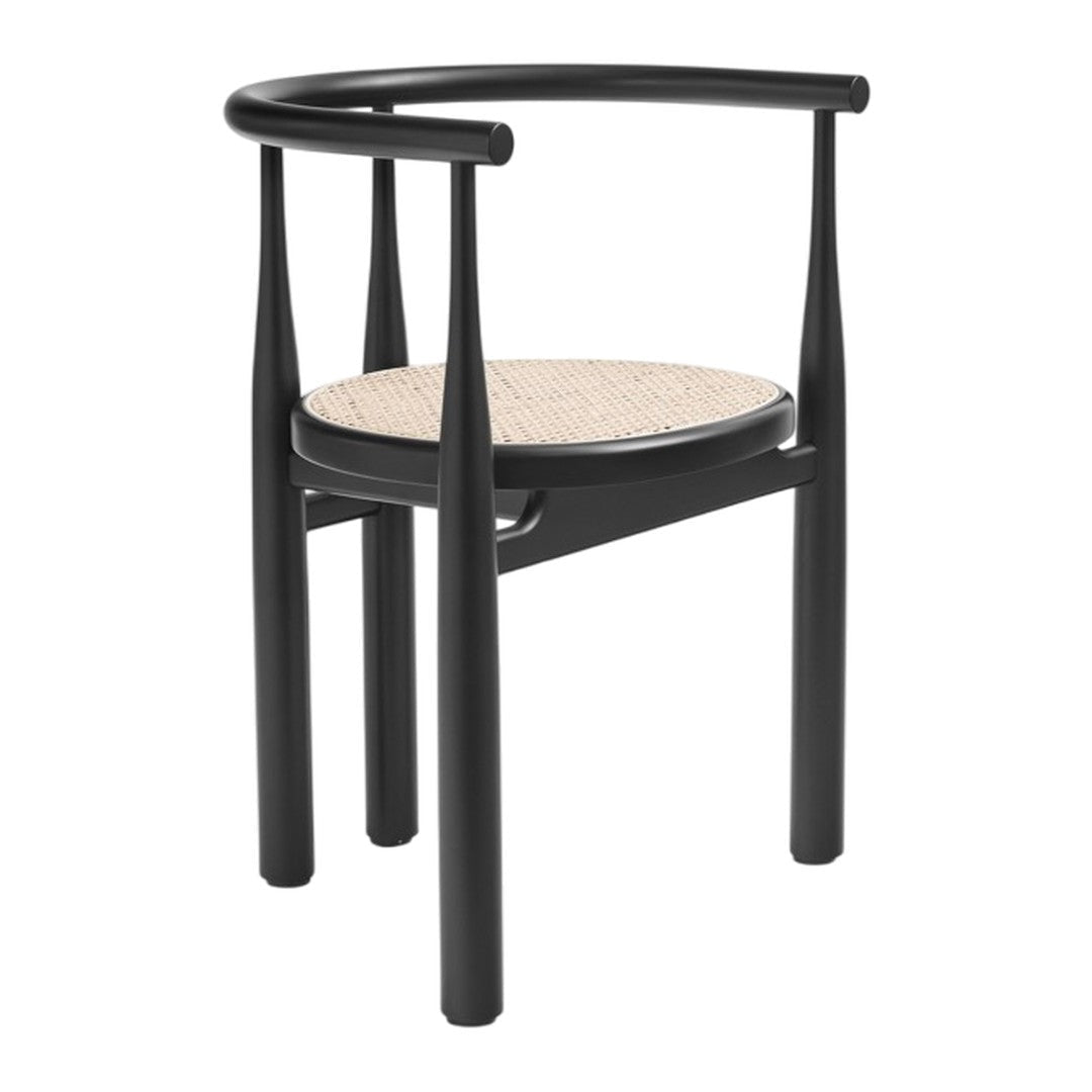 Black chair with sleek lines and a natural woven cane seat design, creating a modern, minimalist aesthetic.