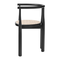 Black wooden chair with a natural woven cane seat, showcasing a minimalist design and elegant contrast in colors.