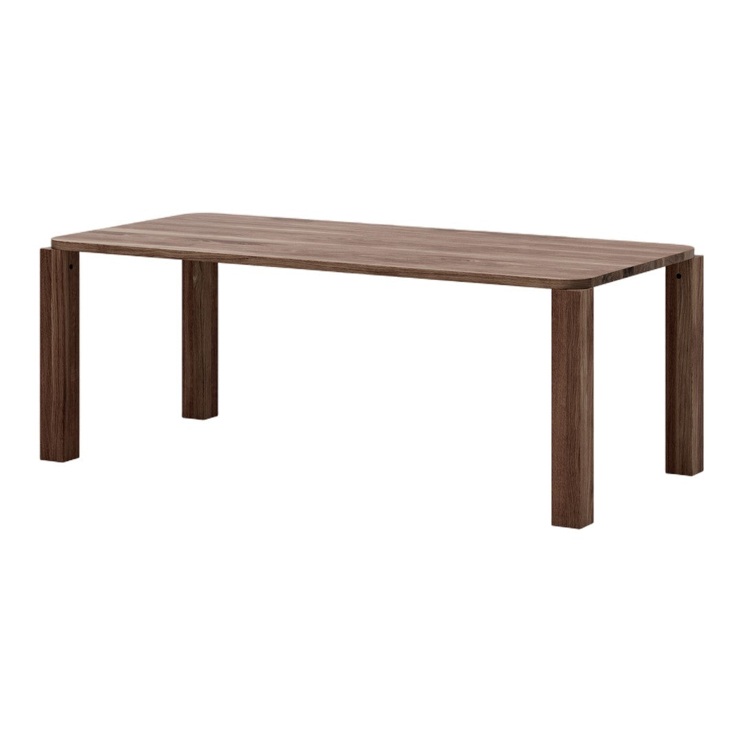 Brown wooden dining table with a smooth surface and minimalistic design, featuring distinct wood grain patterns.