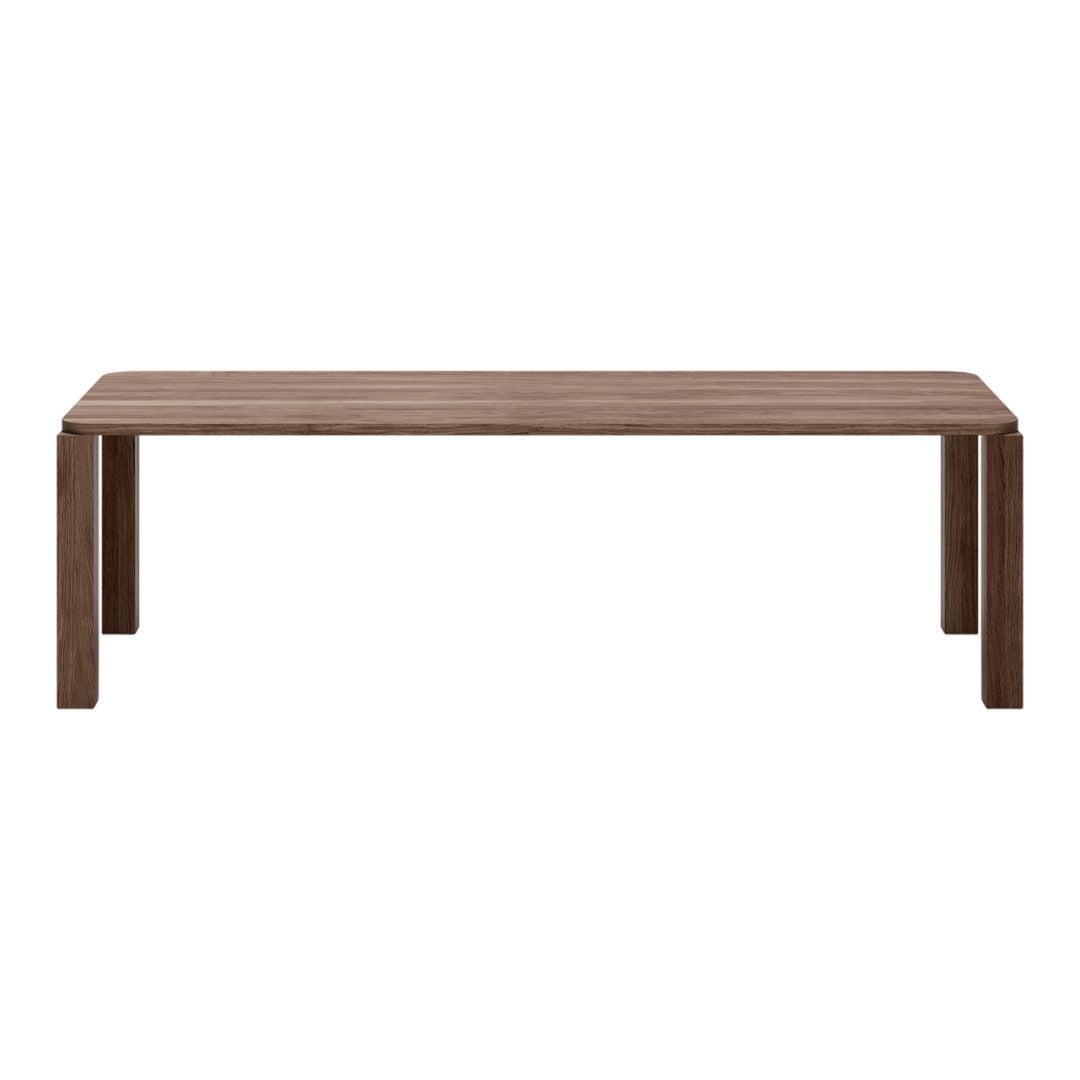 Brown wood dining table with a smooth, minimalist design and straight lines. Elegant, textured surface finish.