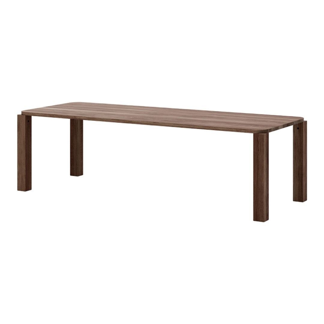 Brown wooden dining table with a smooth, natural wood grain finish and sleek, minimalistic design.