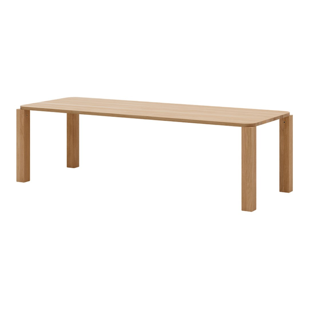 Light oak rectangular table with smooth, natural wood grain finish and minimalist design. Perfect for modern interiors.