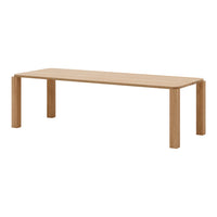 Light oak rectangular table with smooth, natural wood grain finish and minimalist design. Perfect for modern interiors.