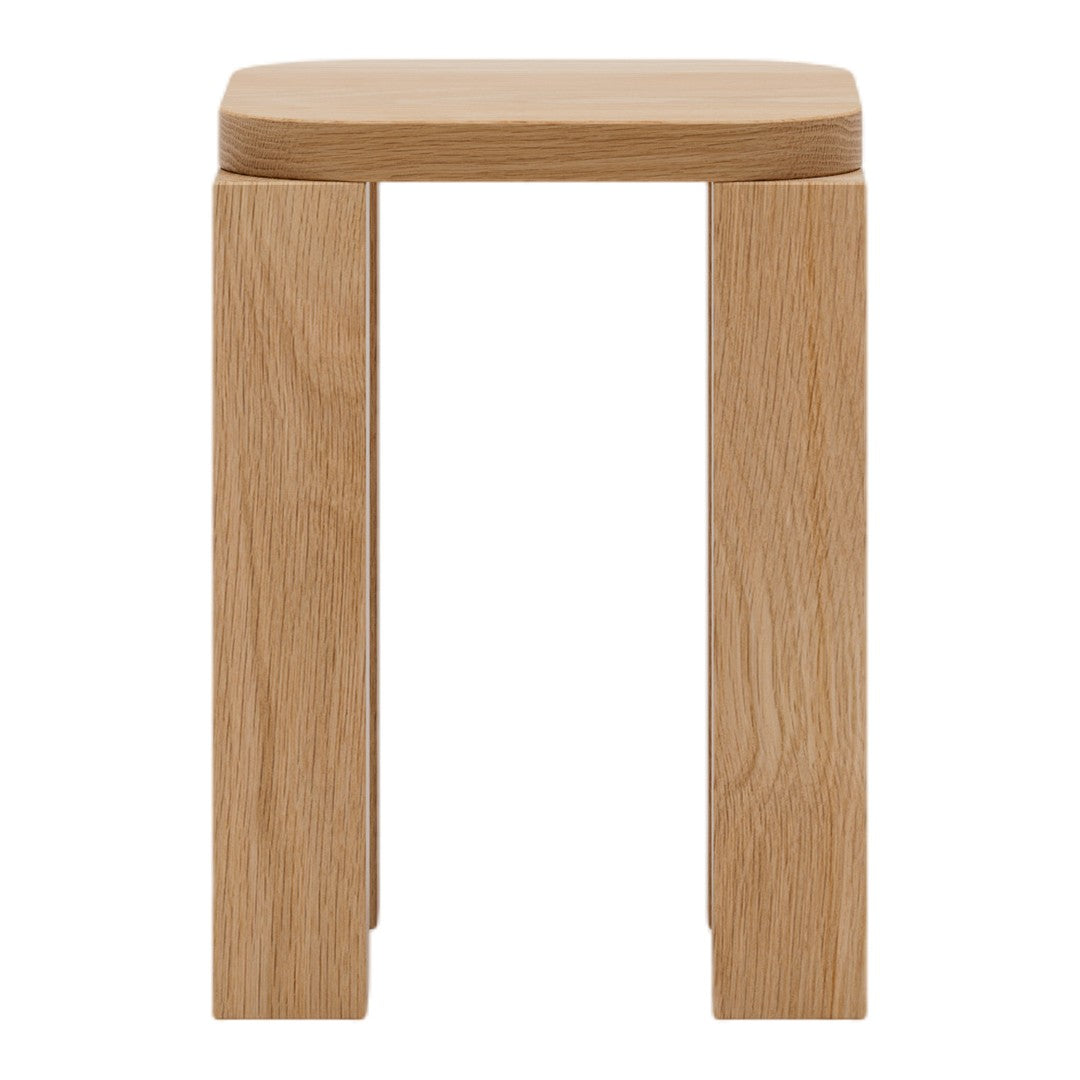 Natural light wood stool with a smooth finish and clean lines, showcasing a minimalist design.